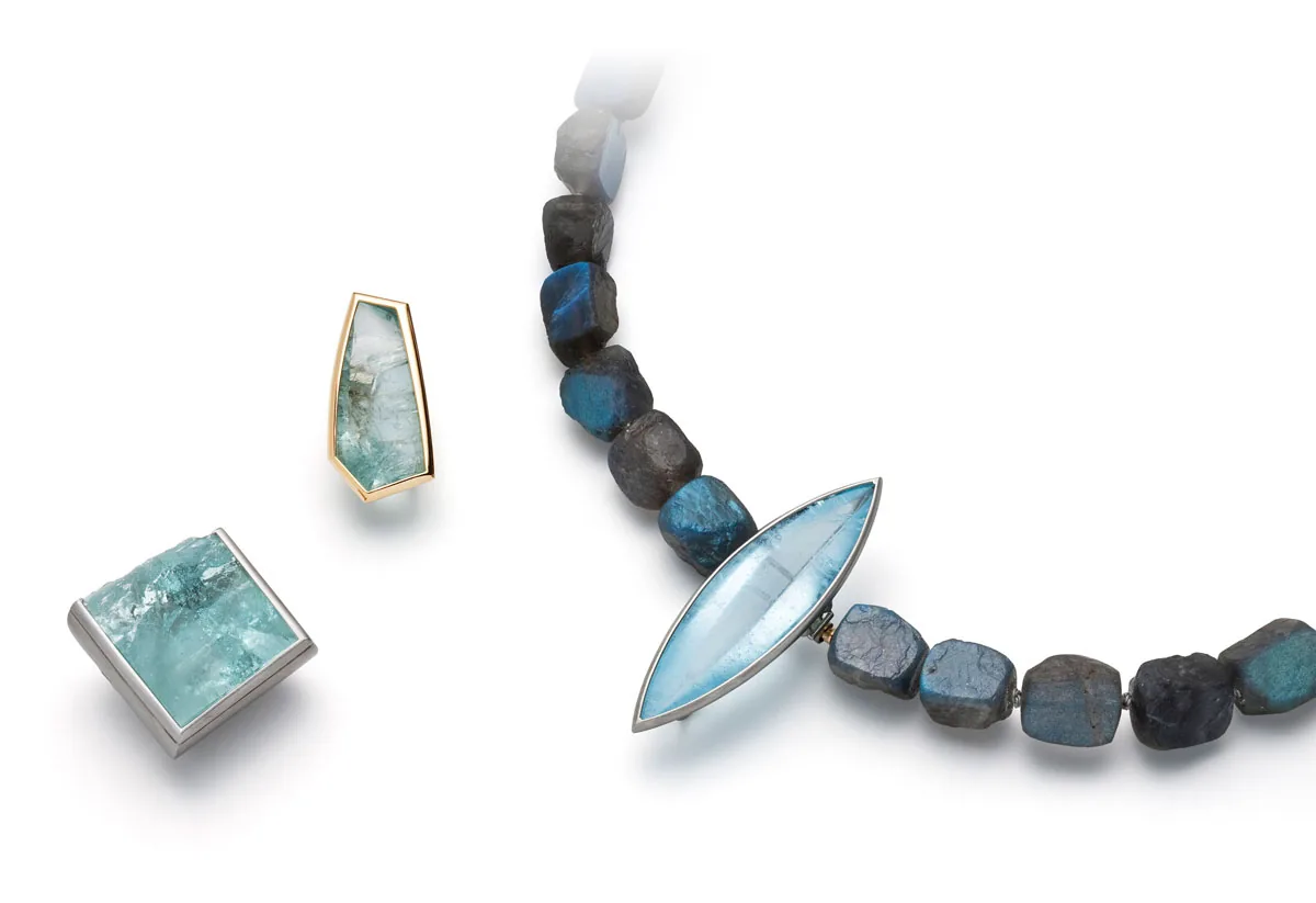 Necklace with blue gemstones and matching earrings