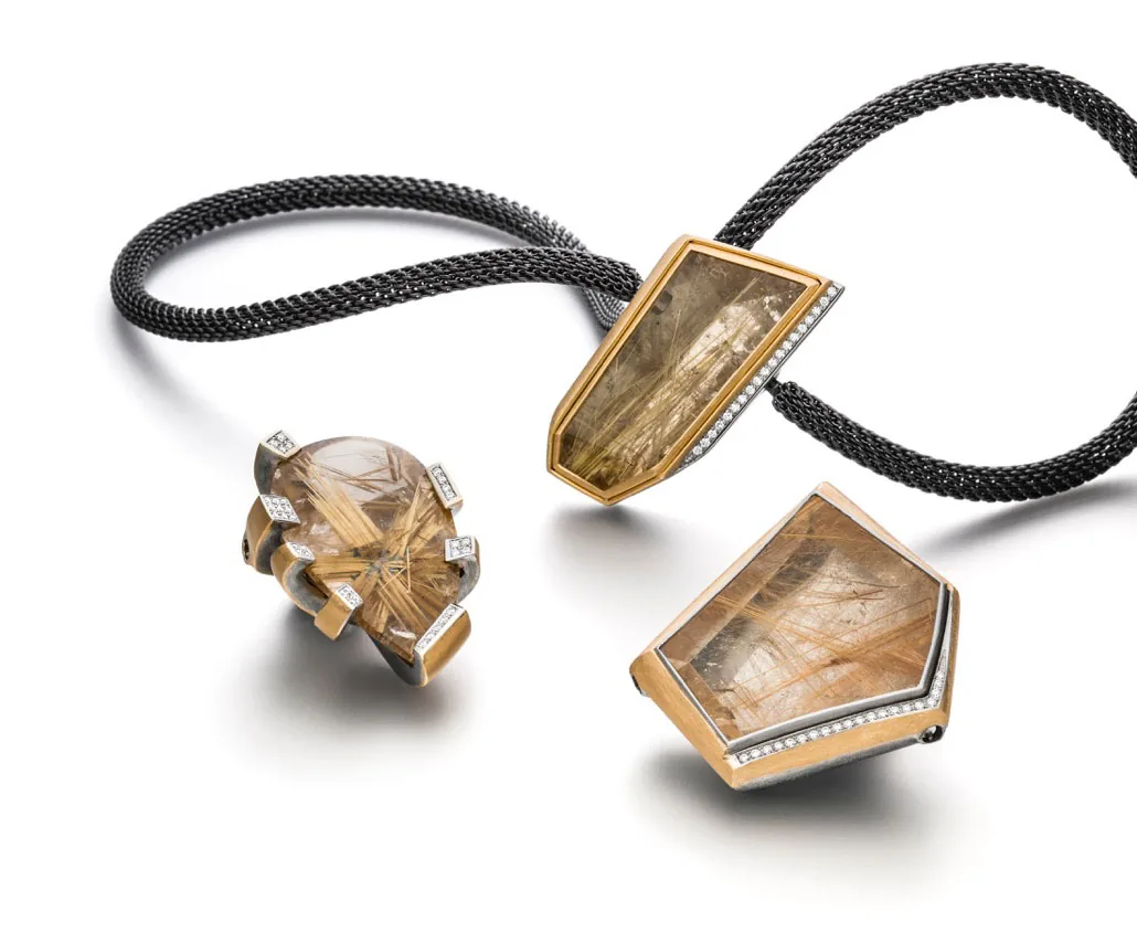 Rubber necklace with rutilated quartz clasps and ring